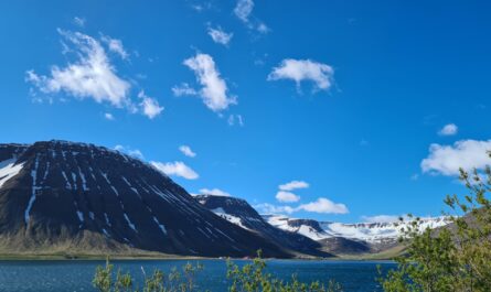 Blue Sky And Clouds Over Isafjordur Town